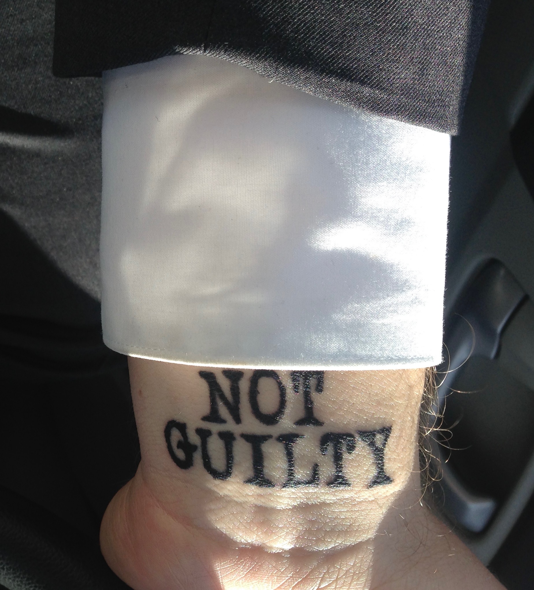 Lawyer Loncar with a not guilty tattoo, Commemorating his first jury trial